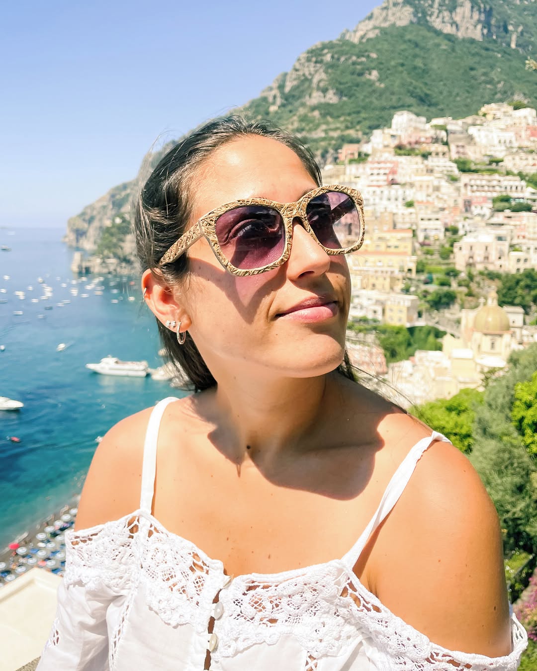 CREO lavender stem sunglasses worn in Positano